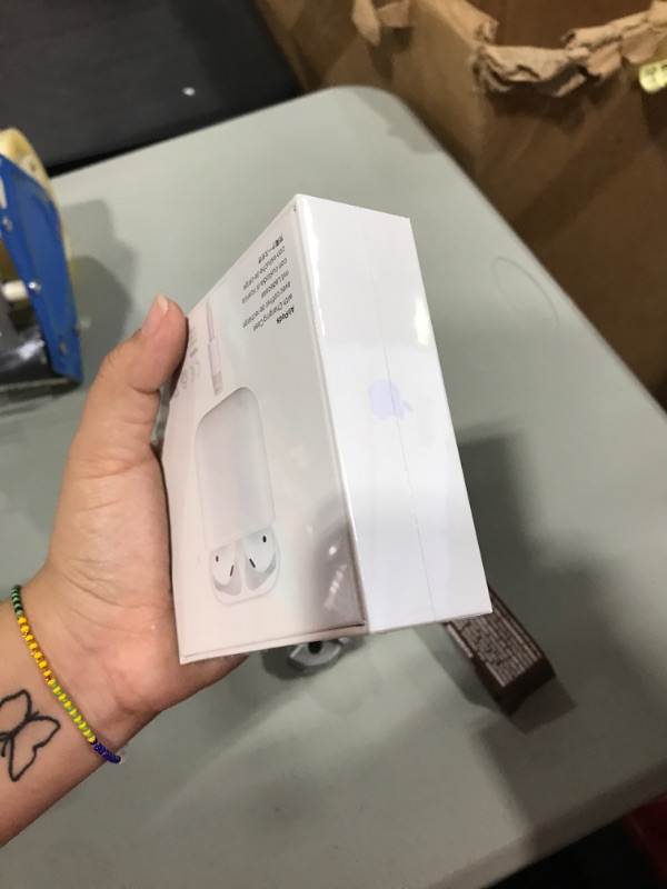 Photo 4 of Apple AirPods (2nd Generation) Wireless Earbuds with Lightning Charging Case Included. Over 24 Hours of Battery Life, Effortless Setup. Bluetooth Headphones for iPhone
FACTORY SEAL 