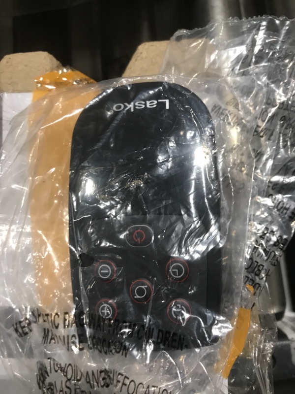 Photo 1 of Lasko Oscillating Ceramic Tower Space Heater for Home with Adjustable Thermostat, Timer and Remote Control, 22.5 Inches, Grey/Black, 1500W, 751320