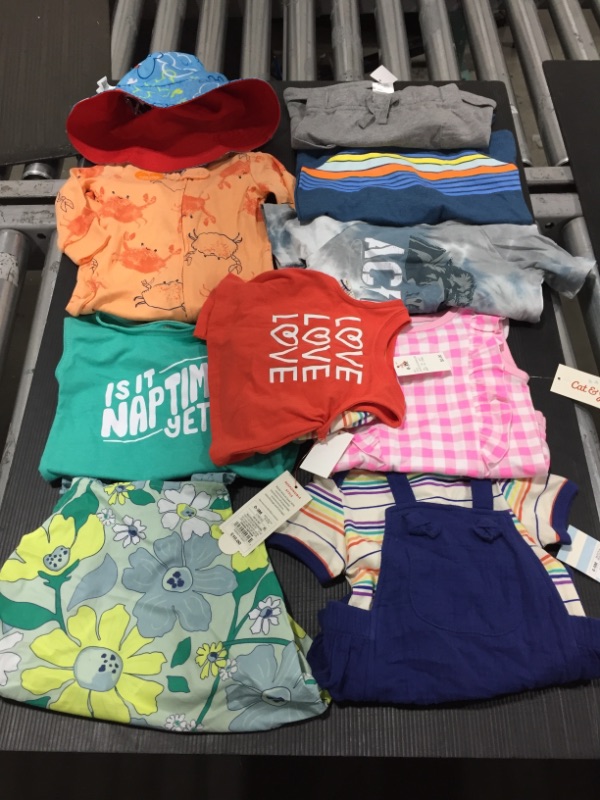 Photo 1 of BUNDLE OF BABY BOY AND GIRL CLOTHING, SIZES VARY 