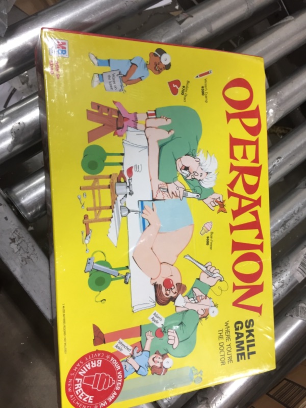 Photo 1 of Classic electronic skill and action game challenges you to "operate" on your patient Use the tweezers to remove Sam's funny ailment parts If you touch 