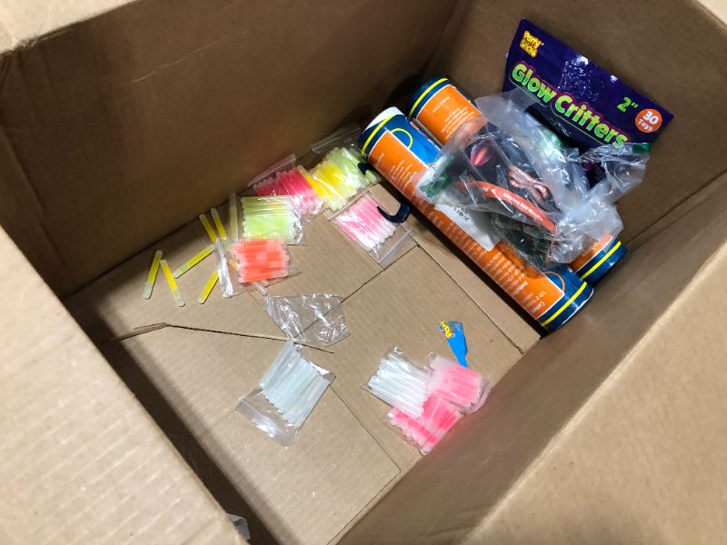 Photo 1 of BOX LOT OF ASSORTED GLOW STICKS AND GLOW TOYS, MULTI COUNT