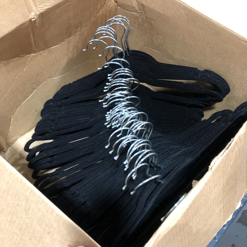 Photo 3 of Amazon Basics Slim, Velvet, Non-Slip Suit Clothes Hangers, Black/Silver - Pack of 99
59 unpacked - 40 packaged. 
