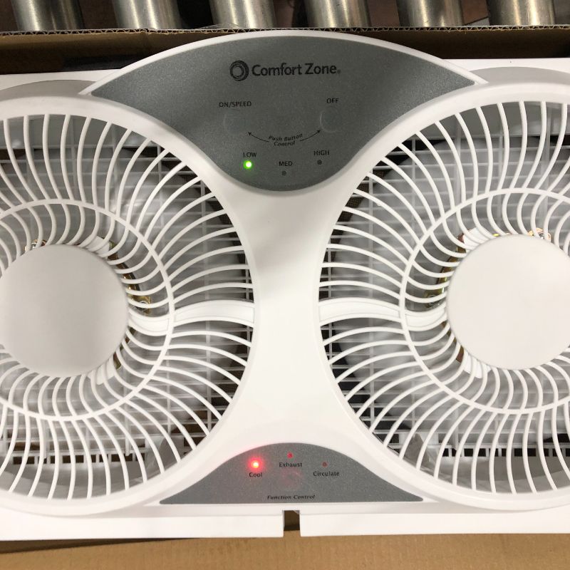 Photo 2 of Comfort Zone Cz310R Reversible Twin Window Fan in White
