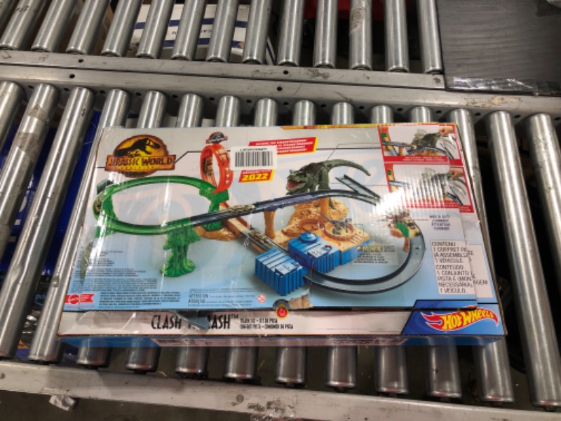 Photo 1 of Hot Wheels Jurassic World Dominion Clash ‘N Crash Track Set with 1 Hot Wheels Car, Motorized Booster with Attacking Dinosaurs, Toy Gift Set for Dino Fans