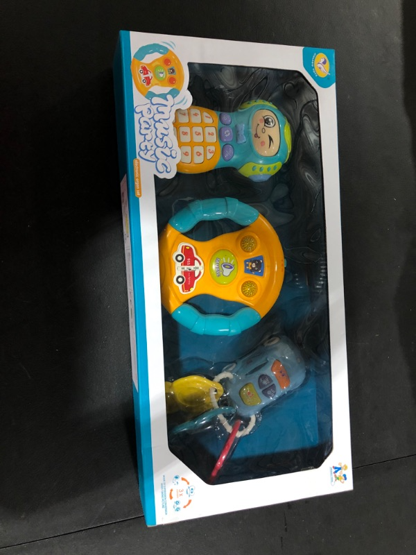 Photo 2 of deAO Kids Steering Wheel Mobile Phone and Car Key Fob Toys for Kids with Light and Sound Effects for Toddlers Simulated Driving Pretend Driving - Great Fine Motor and Sensory Development Toy
