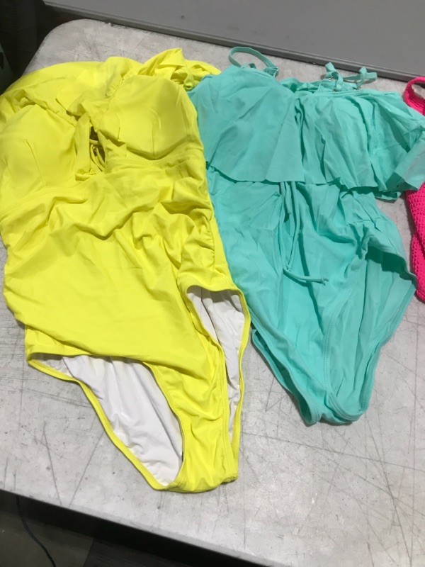 Photo 1 of BAG OF WOMENS SWIMWEAR -- ALL NEW ITEMS!!!! (SIZES VARY) 