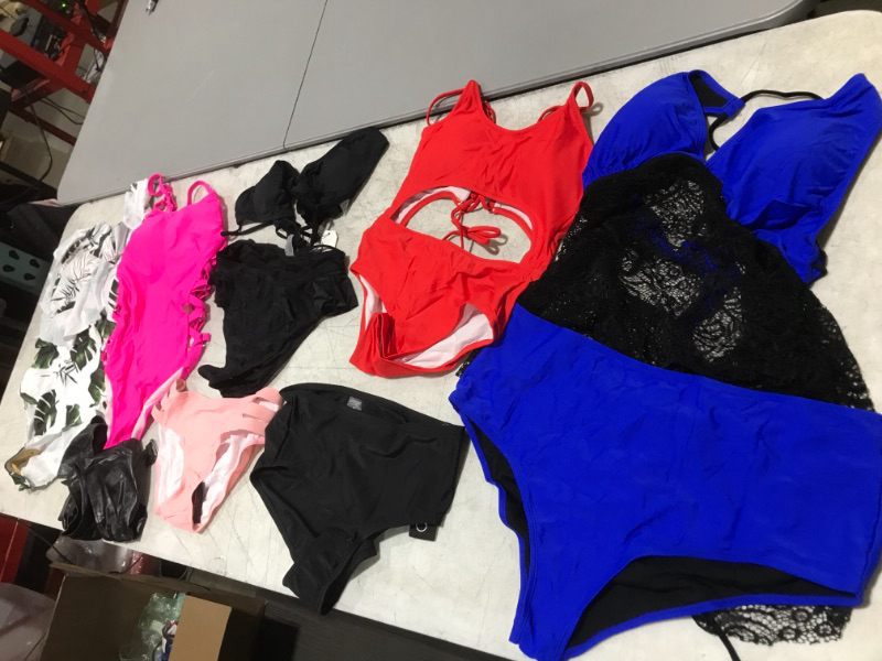 Photo 1 of BAG OF WOMENS SWIMSUITS -- SIZES VARY 