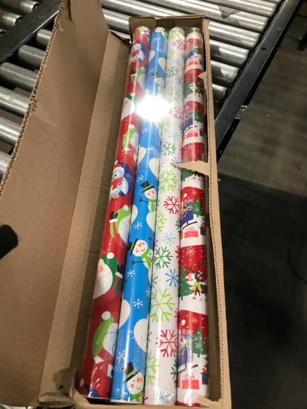Photo 1 of American Greetings Christmas Reversible Wrapping Paper Bundle, Santa, Snowflakes and Snowmen (4 Rolls, 160 sq. ft.)