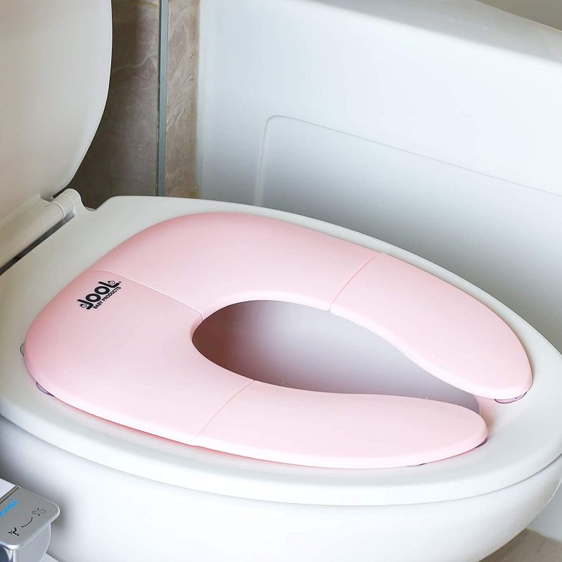 Photo 1 of Folding Travel Potty Seat for Toddlers, Fits Round & Oval Toilets, Non-Slip Suction Cups, Includes Free Travel Bag - Jool Baby
