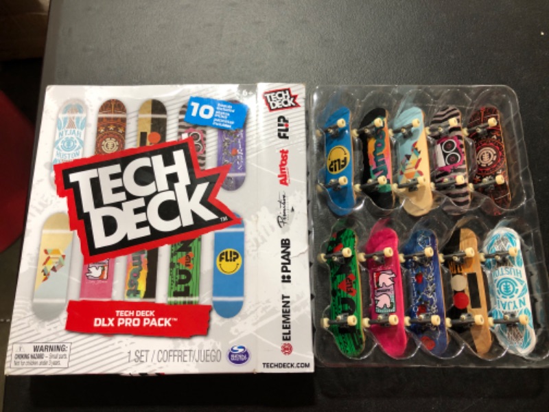 Photo 2 of Tech Deck, DLX Pro 10-Pack of Collectible Fingerboards, For Skate Lovers Age 6 and up
