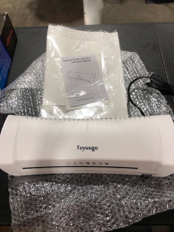 Photo 2 of Toyuugo White SL200 A4 Laminator Hot And Cold Warm Up Laminating Machine
