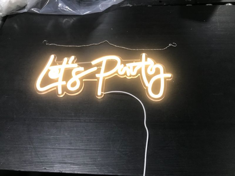 Photo 1 of Ajoyferris Let's Party Neon Signs Dimmable Neon Light Sign for Wall Decor 16''x 7'' Word LED Neon Sign Art Decorative Lights for Bachelorette Party, Engagement Party, Birthday Party,Wedding Party Warm White
