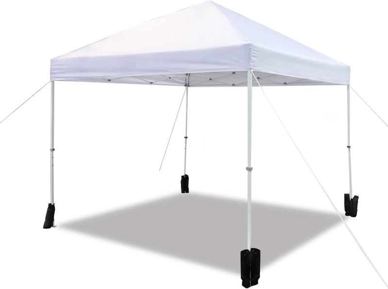 Photo 1 of Amazon Basics Outdoor Pop Up Canopy, 10ft x 10ft with Wheeled Carry Bag, 4-pk weight bag, White
