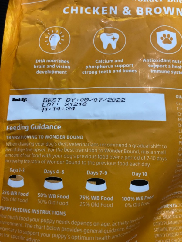 Photo 3 of Amazon Brand - Wonder Bound High Protein, Dry Puppy Food - Chicken & Brown Rice Recipe, 5 Lb Bag ripped bag. Best by 08/2022
