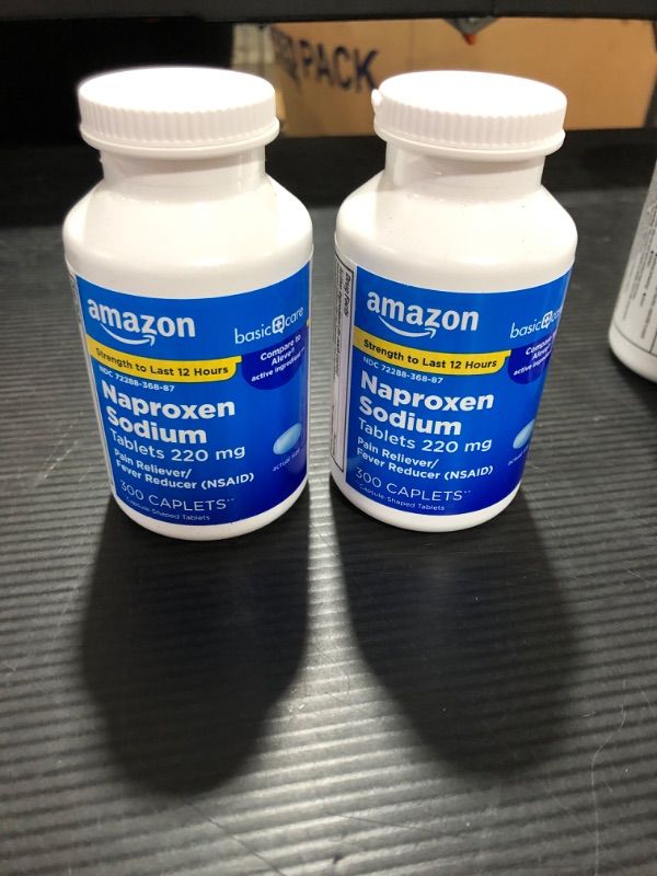 Photo 2 of (2 PACK) Amazon Basic Care Naproxen Sodium Tablets, 300 Count. Best by 07/2023