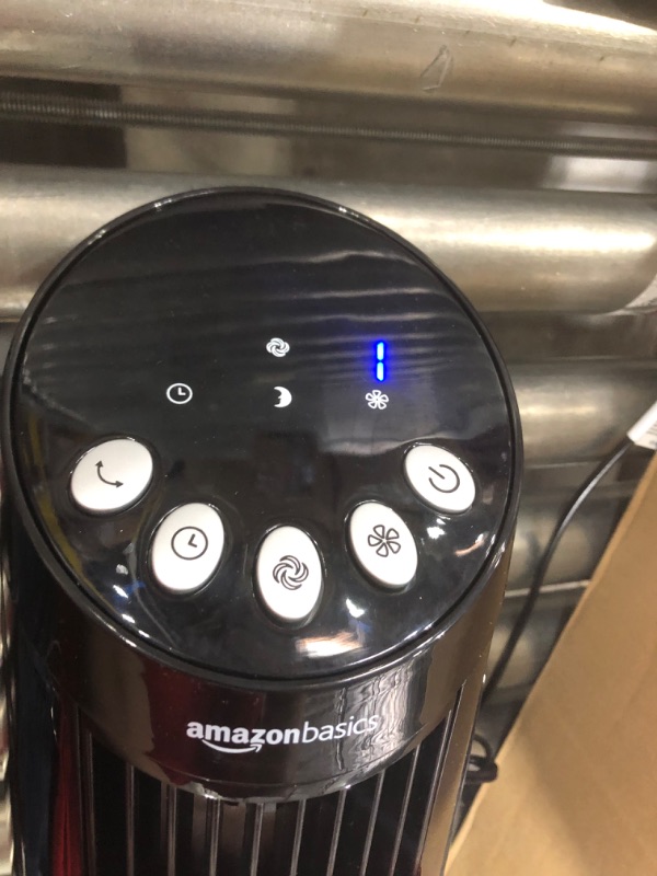 Photo 1 of Amazon Basics Digital Oscillating 3 Speed Tower Fan with Remote
