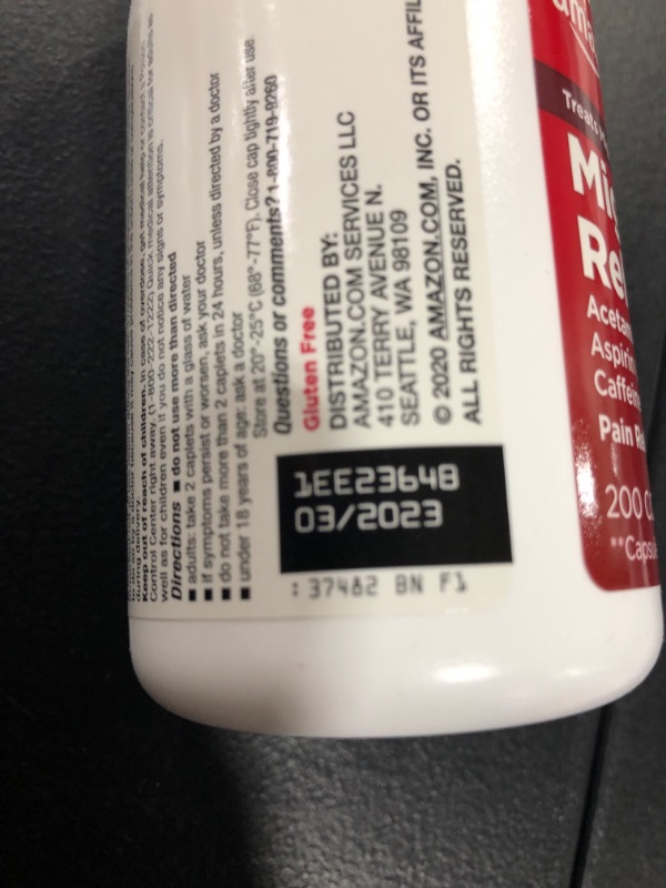 Photo 1 of Amazon Basic Care Migraine Relief, Acetaminophen, Aspirin (NSAID) and Caffeine Tablets, 200 Count 9best by 3/2023)
