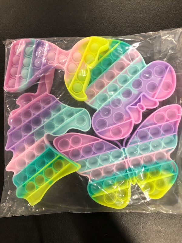 Photo 1 of 4 piece fidget toy set