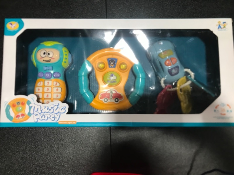 Photo 2 of deAO Kids Steering Wheel Mobile Phone and Car Key Fob Toys for Kids with Light and Sound Effects for Toddlers Simulated Driving Pretend Driving - Great Fine Motor and Sensory Development Toy
