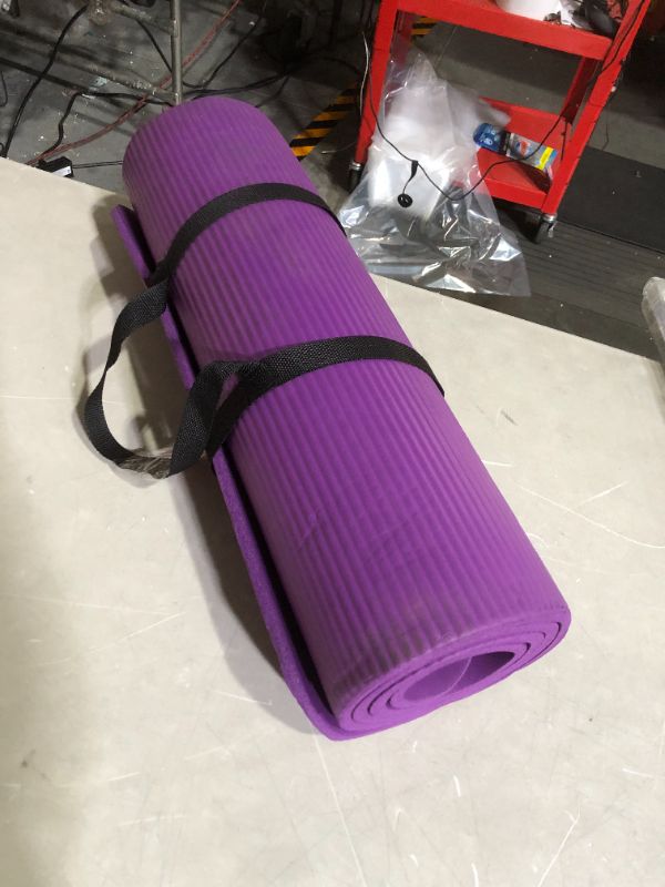 Photo 2 of ***DAMAGED - SEE NOTES***
Gaiam Essentials Thick Yoga Mat Fitness & Exercise Mat 72"L x 24"W x 2/5 Inch Thick Purple