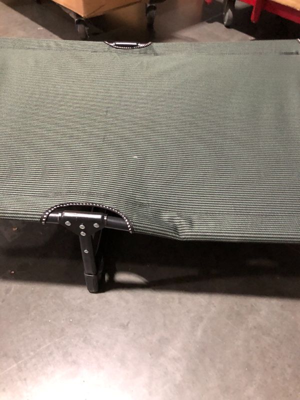 Photo 1 of ***BENT - DOESN'T UNFOLD FULLY - NO MATTRESS - CHAIR ONLY***
ETSG Portable Folding Camping Cot, Oversize 29.5in Adjustable