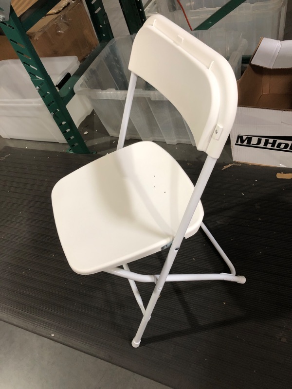 Photo 2 of Plastic Folding Chair, 