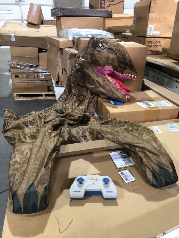 Photo 2 of AIRTITANS Jurassic World Inflatable T Rex RC – Massive Attack Air Titans Dinosaur - Over 6 Feet Long - Turns & Spins - Stomps & Roars!