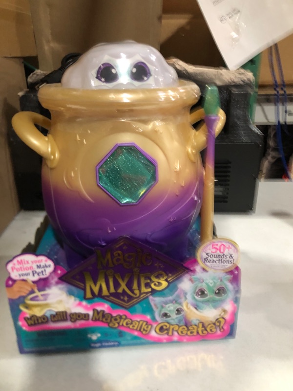 Photo 2 of Magic Mixies Magical Misting Cauldron with Interactive 8 inch Blue Plush Toy and 50+ Sounds and Reactions, Multicolor