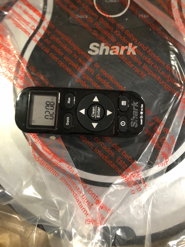 Photo 1 of Shark ION Robot Dual-Action Robot Vacuum Cleaner with 1-Hour Plus of Cleaning Time, Smart Sensor Navigation and Remote Control (RV720)