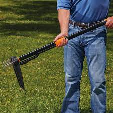 Photo 1 of * USED * 
Fiskars 4-Claw Stand Up Weeder - Gardening Hand Weeding Tool with 39" Ergonomic Handle - Black