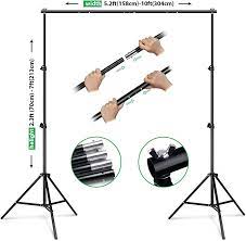 Photo 1 of HPUSN Backdrop Stand - 10ft x 7ft Adjustable Photoshoot Backdrop - Photo Backdrop Stand for Parties - Backdrop Includes Travel Bag, Sand Bags, Clamps - Photo Video Studio