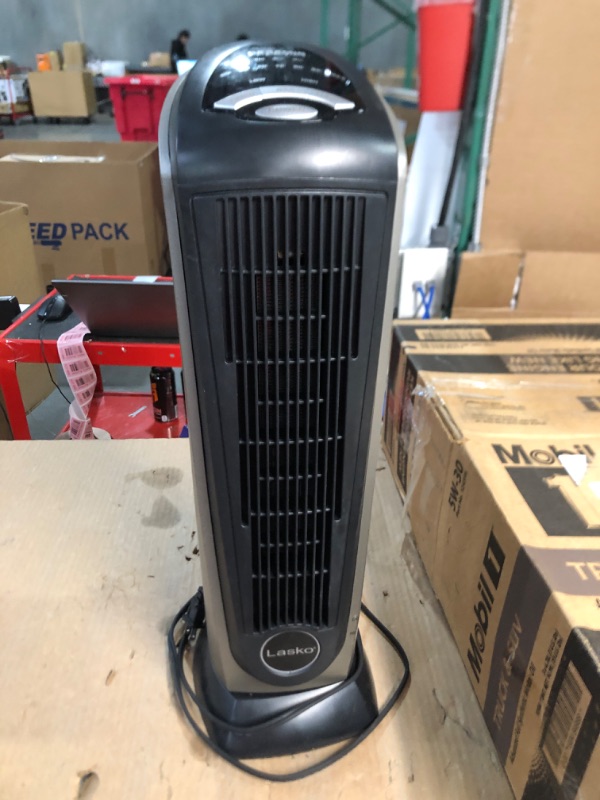 Photo 2 of * USED * 
Lasko Oscillating Ceramic Tower Space Heater for Home with Adjustable Thermostat, Timer and Remote Control, 22.5 Inches, Grey/Black, 1500W, 751320