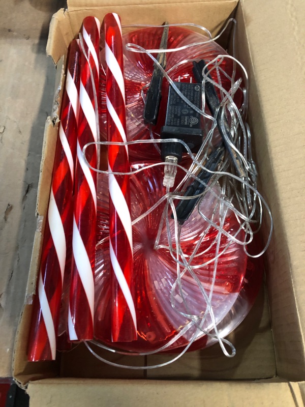 Photo 2 of * USED * 
 4 Pcs Lighted Candy Cane DecorationS Outside for Yard Lawn Garden