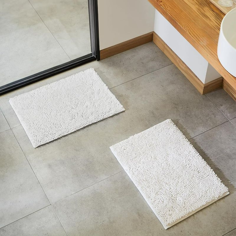 Photo 1 of **STOCK IMAGE FOR SAMPLE**
Amazon Basics Bathroom Rugs Set 2 Pieces, Non Slip Absorbent Bath Mats for Bathroom White 17" x 24"