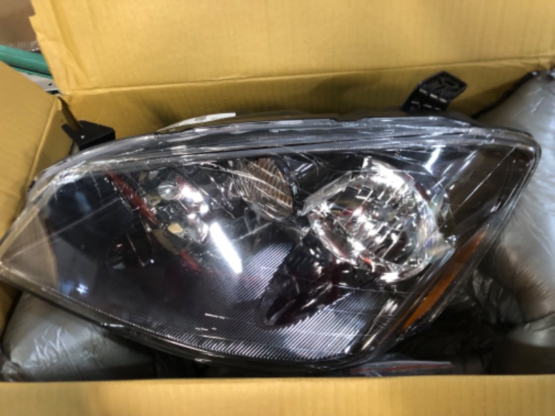 Photo 2 of Dorman 1591153 Driver Side Headlight Assembly Compatible with Select Nissan Models