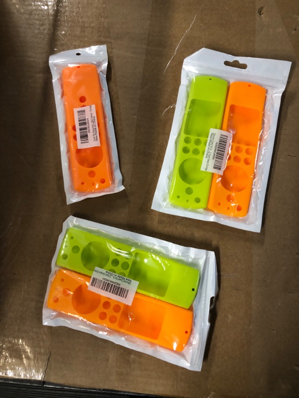 Photo 2 of ***SEE NOTES*** Remote Cover for Fire TV Stick, 5 Pack, 3 Orange, 2 Lime