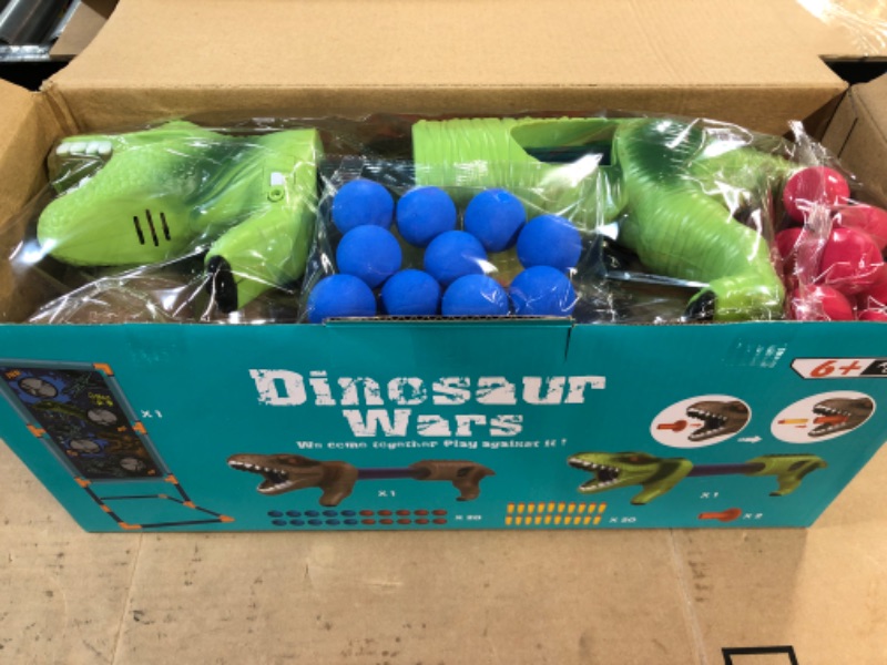 Photo 1 of Dinoera 2-in-1 Dinosaur Foam Ball Air Gun Popper Shooting Game Set Compatible with Nerf Toys