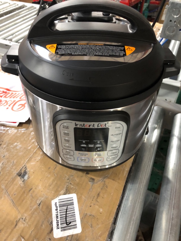 Photo 2 of (Item is dented) Instant Pot Duo 7-in-1 Electric Pressure Cooker,  Stainless Steel, 6 Quart 