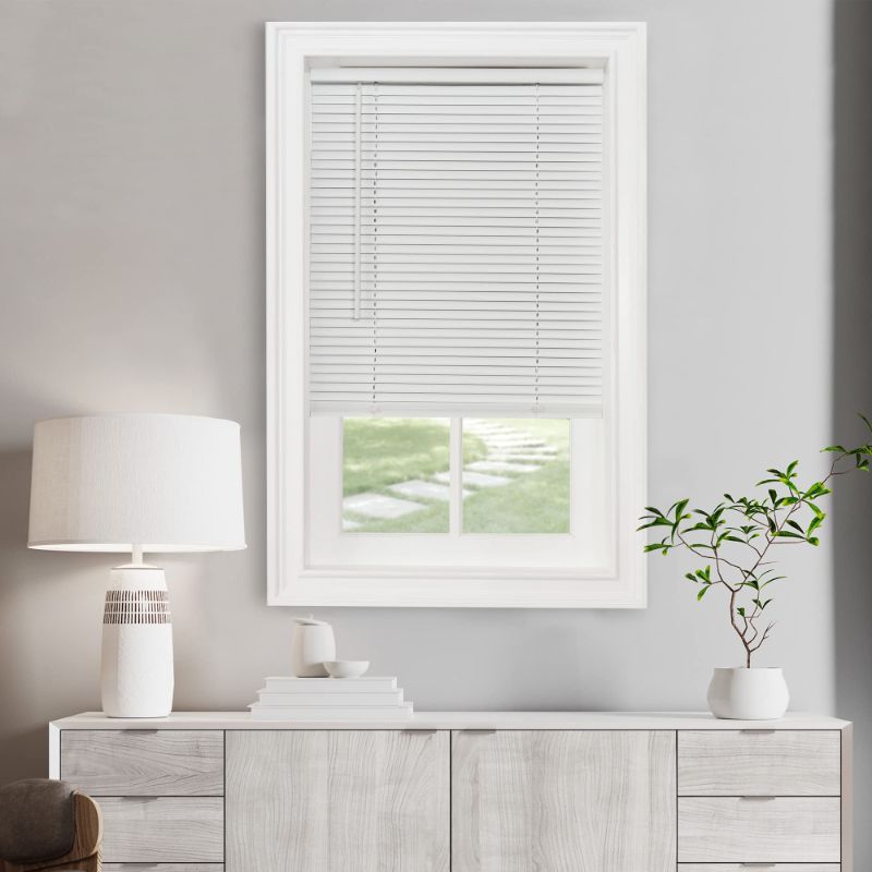 Photo 1 of **MISSING TWIST STICK TO ADJUST BLINDS** Cordless Light Filtering Mini Blind - 29 Inch Length, 72 Inch Height, 1" Slat Size - Pearl White 