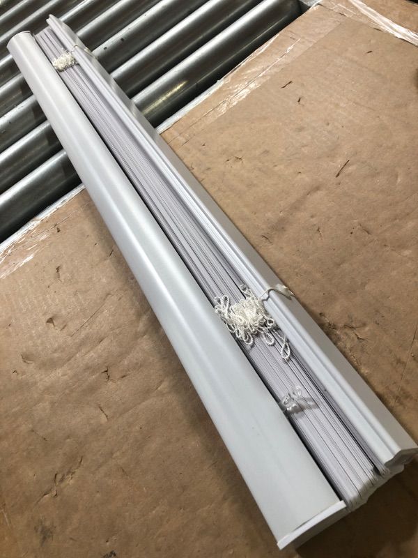 Photo 2 of **MISSING TWIST STICK TO ADJUST BLINDS** Cordless Light Filtering Mini Blind - 29 Inch Length, 72 Inch Height, 1" Slat Size - Pearl White 