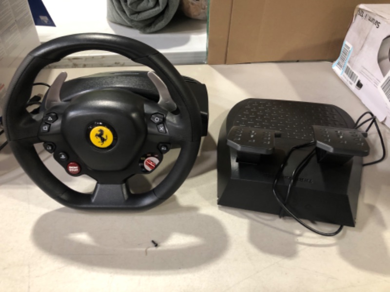 Photo 3 of **SEE NOTES**
THRUSTMASTER T80 Ferrari with NRL Wheel Stand Lite Bundle T80 Ferrari NRL Wheel Stand Bundle