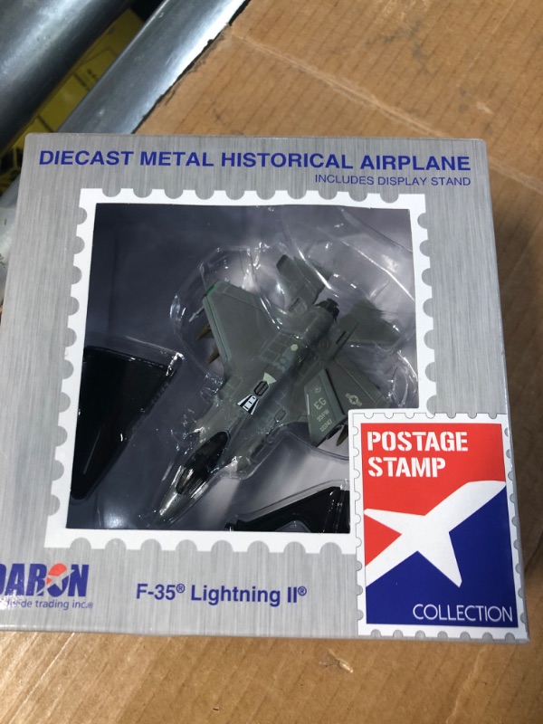 Photo 2 of Daron Postage Stamp PS5602 USAF F-35 Version A , Lightning II , 1/144 Scale Diecast Model with Stand