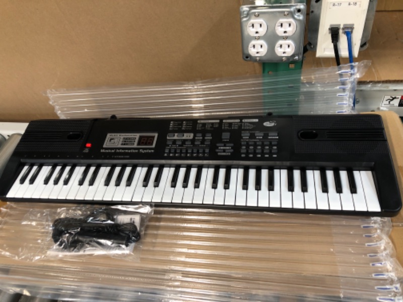 Photo 2 of *SEEMS NEW* Digital Music Piano Keyboard 61 Key, Portable Electronic Musical Instrument Multi-function Keyboard and Microphone