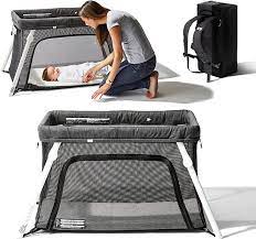 Photo 1 of Lotus Travel Crib - Backpack Portable, Lightweight, Easy to Pack Play-Yard with Comfortable Mattress - Certified Baby Safe