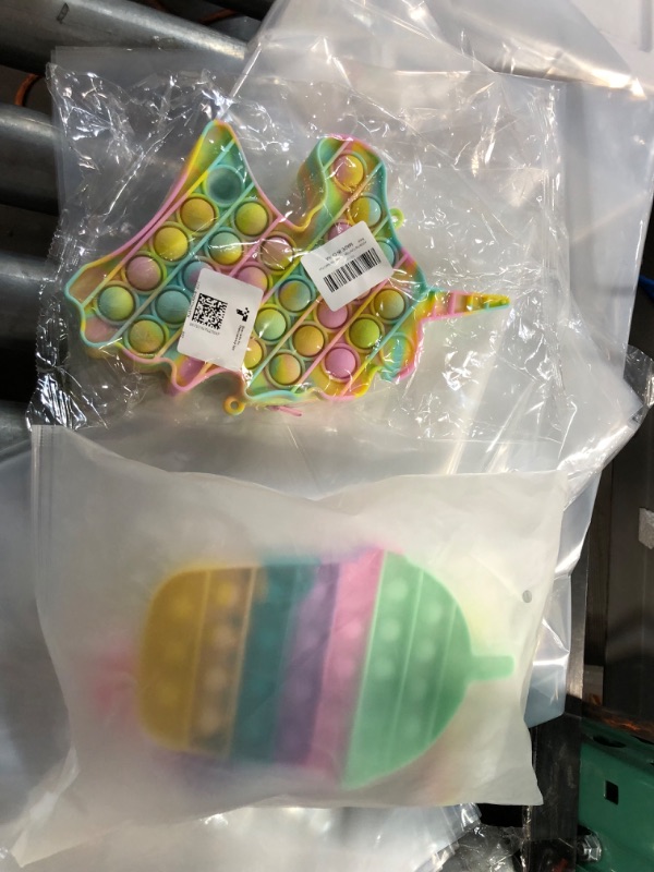 Photo 1 of Fidget Pop Toy Set, One Purse and Three Pop Toys