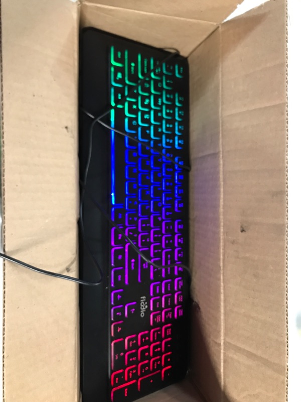 Photo 2 of Fiodio Rainbow Membrane Gaming Keyboard, Quiet Wired Computer Keyboard, 104 Silent & 26 Anti-Ghosting Keys, Spill Resistant, Multimedia Control for PC and Desktop