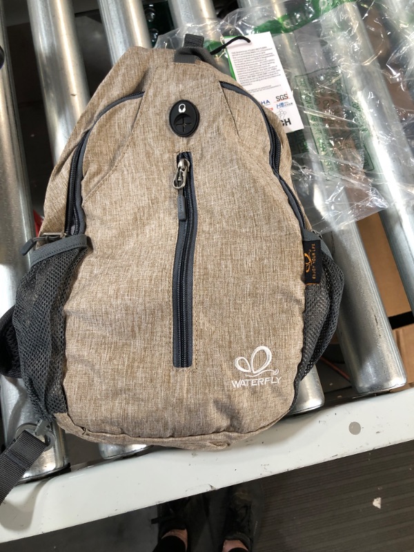 Photo 2 of *NEW* WATERFLY Crossbody Sling Backpack