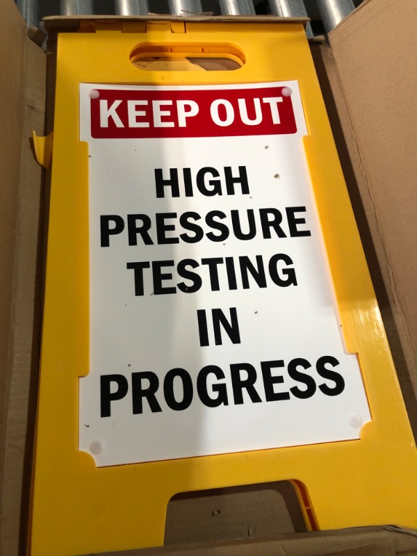 Photo 2 of *DAMAGED* SmartSign "Keep out - High Pressure Testing in Progress" Folding Floor Sign