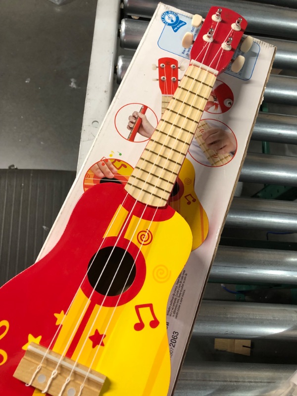 Photo 3 of **USED/SEE NOTES ** Hape Kid's Wooden Toy Ukulele in Red, L: 21.9, W: 8.1, H: 3 inch