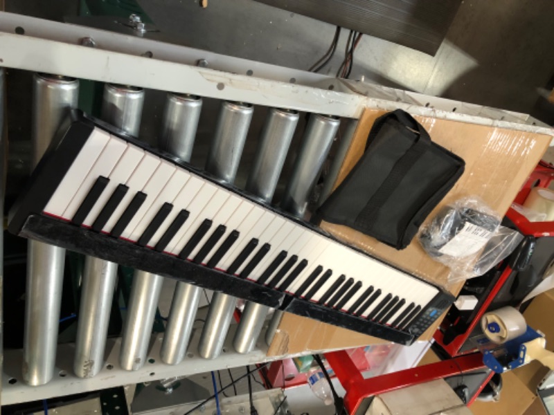 Photo 3 of ***UNTESTED*** KONIX 61 Key Folding Piano Keyboard, and Piano Bag PJ61B